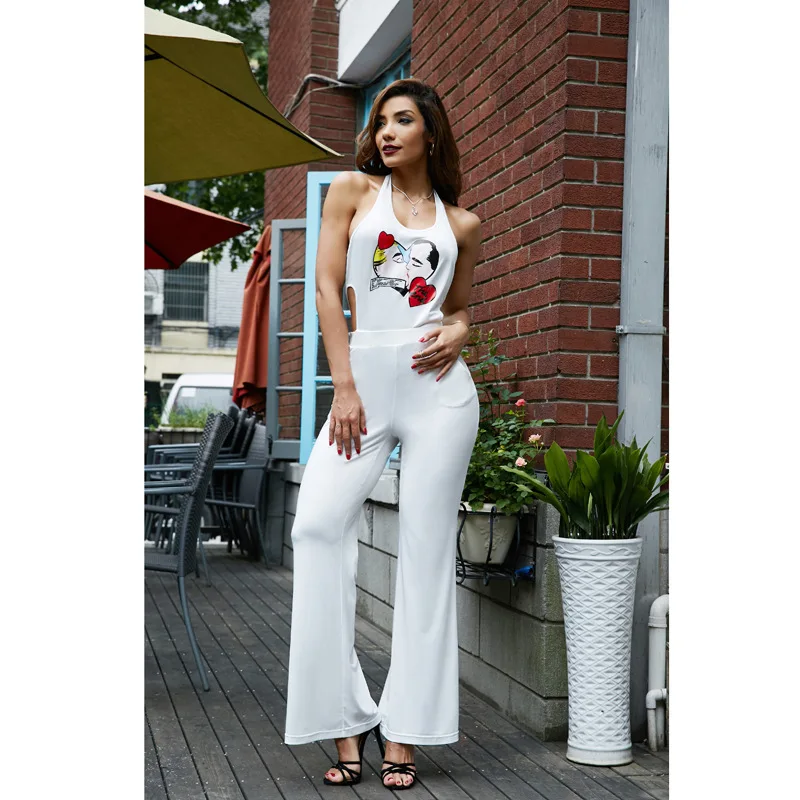 

2021 the European and American fashion sexy women's neck hung back leakage nightclub hollow out printing jumpsuits