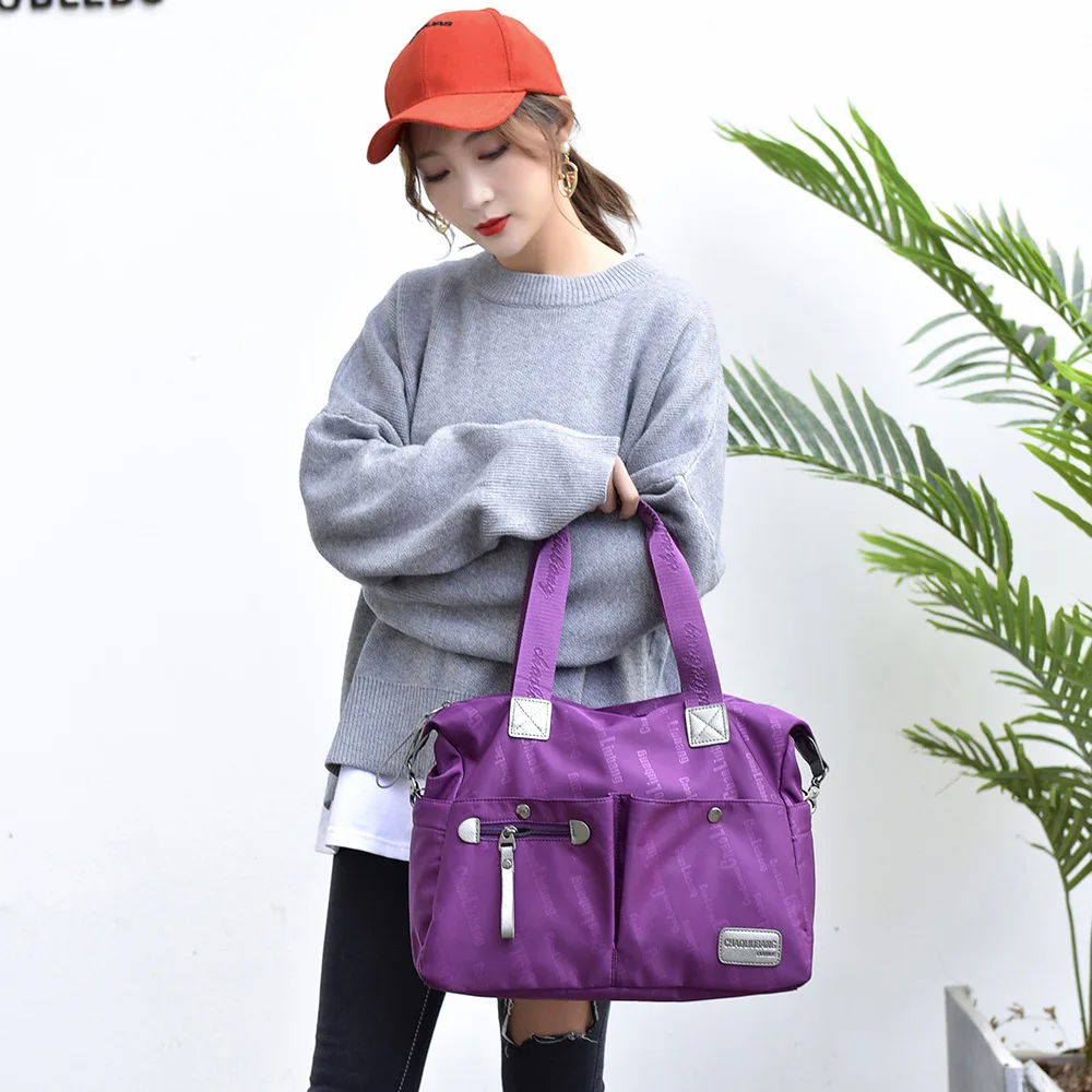 2021 new version of Oxford cloth shoulder bag men and women casual waterproof messenger large capacity fashion simple handbagW34