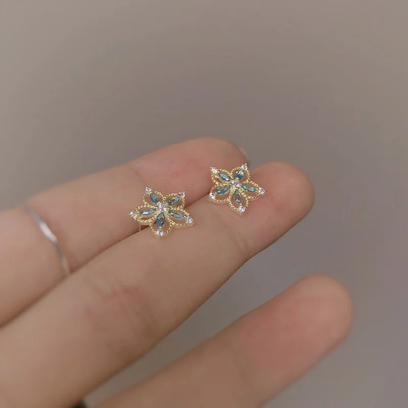 

Exquisite Silver Color Hollow Flower Blue Zircon Opal Stud Earrings For Girl Women Cute Jewelry Accessories Christmas Gifts