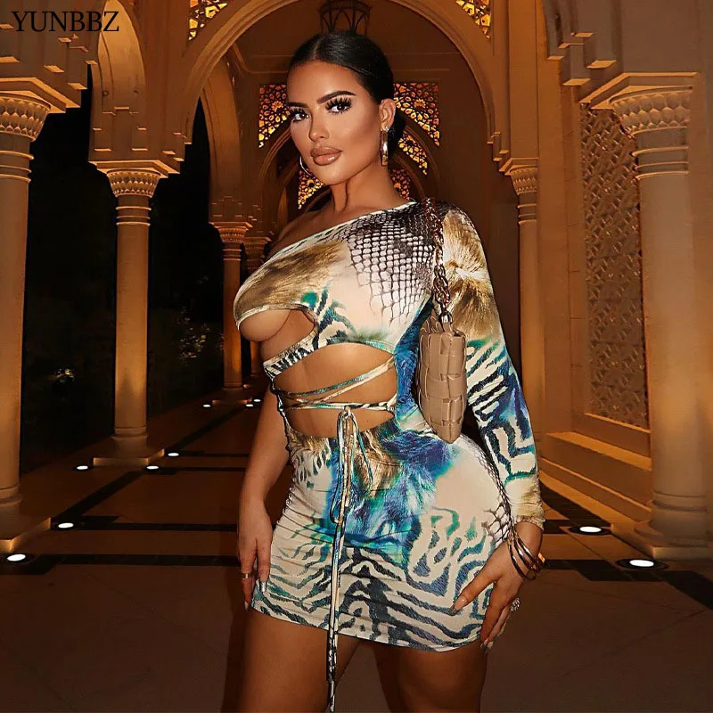 

YUNBBZ Animal Print Sexy Bodycon Birthday Dresses for Women 2022 Y2k Clothes Cut Out One Shoulder Long Sleeve Club Party Dress