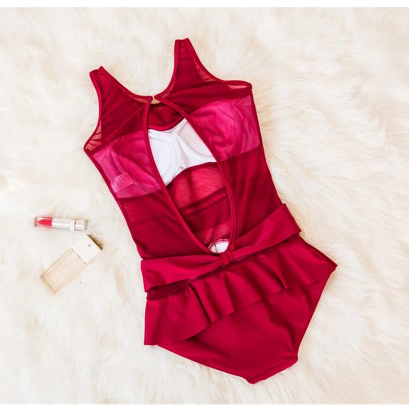 Женский слитный купальник STAERK черный со стальным покрытием узким животом