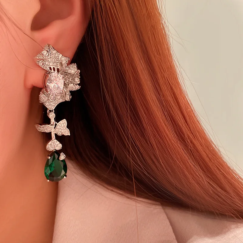 

Retro petals inlaid with zirconium flowers, green water drops and gem earrings Joker long 925 silver earrings temperament