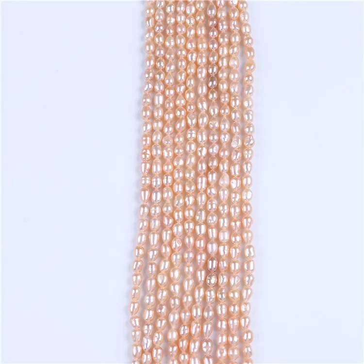 

cheap 5-6mm rice shape freshwater pearl strands for sale