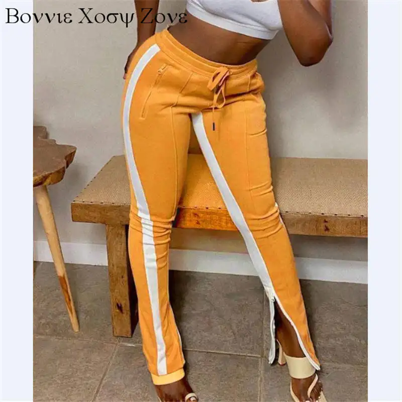 

Женские брюки на завязках с цветным блоком, на молнии