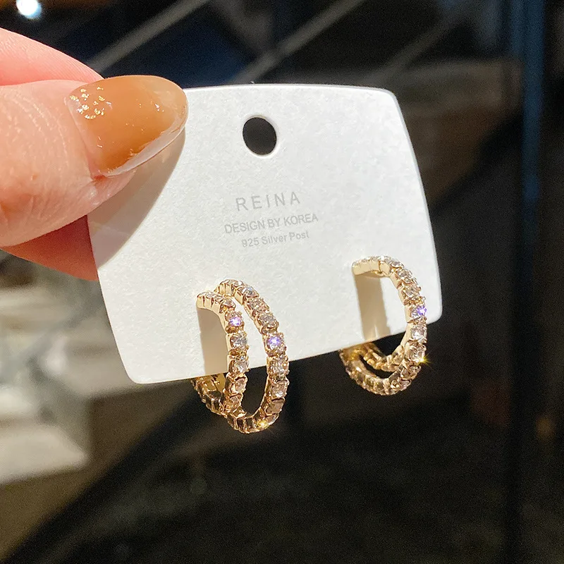 

Double circle shining zircon earrings female micro-encrusted diamond super flash Korean temperament fashion 925 silver ear pins