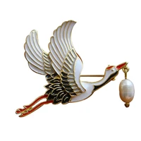 oi new arrival enamel crane bird brooch alloy pearl brooch high quality for women suit jacket animal brooch jewelry accessories