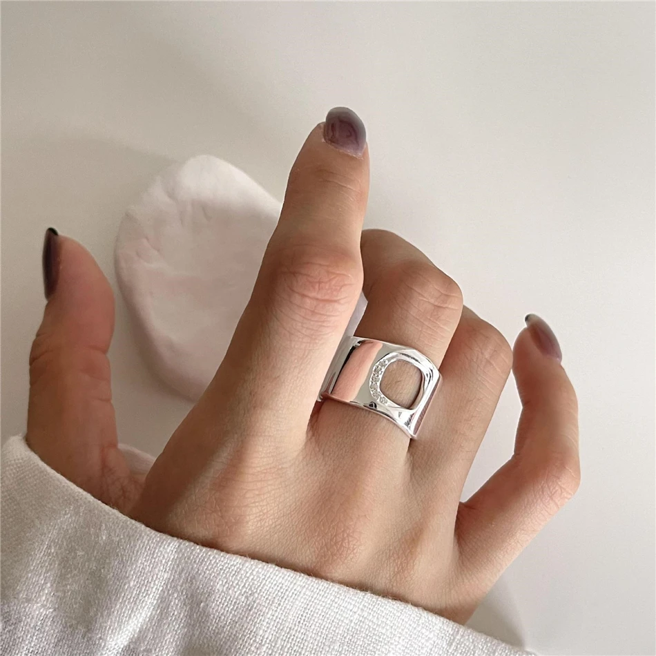 

Женское асимметричное кольцо из серебра 925 пробы, с геометрическим рисунком