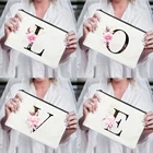 Женская свадебная косметичка на молнии с розовыми цветочными инициалами