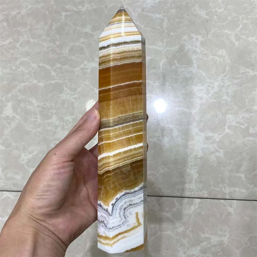 

Rare and beautiful natural thousand-layer calcite crystal obelisk Reiki healing energy scepter room decoration home