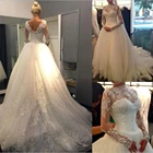 Кружевное свадебное платье-трапеция, с открытой спиной и длинными рукавами