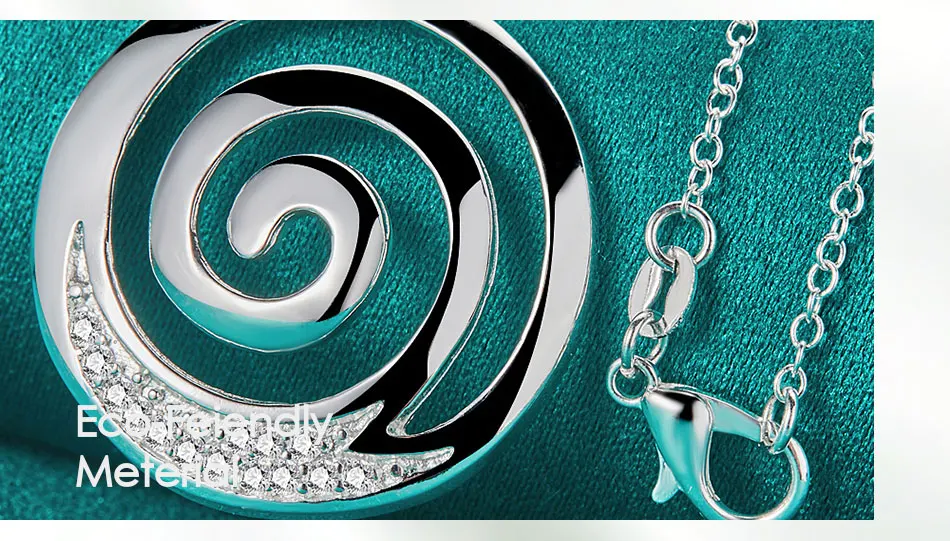 Encante-se com a beleza envolvente do Colar com Pingente Espiral DOTEFFIL, feito em prata esterlina 925 e cravejado com um deslumbrante zircão redondo AAA que capta a luz em todos os ângulos. Um acessório marcante que combina elegância romântica e sofisticação atemporal.