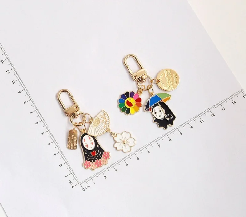 

Spirited Away No Face Man Cartoon Faceless Male Keychains Women Flower Sakura Key Ring Bag Key Chain Gift Jewelry Wholesale Toy