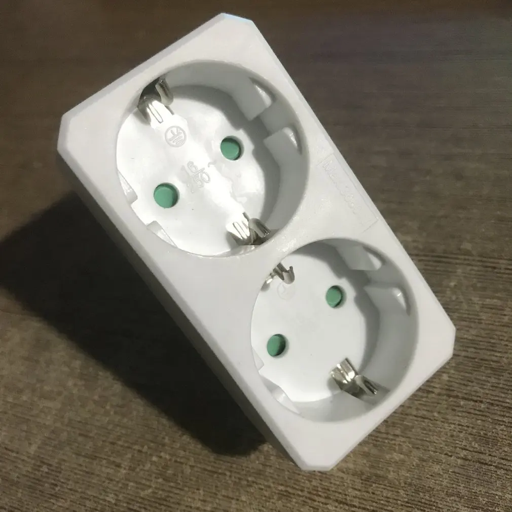 Переходник для розетки один поворот несколько два или три отверстия