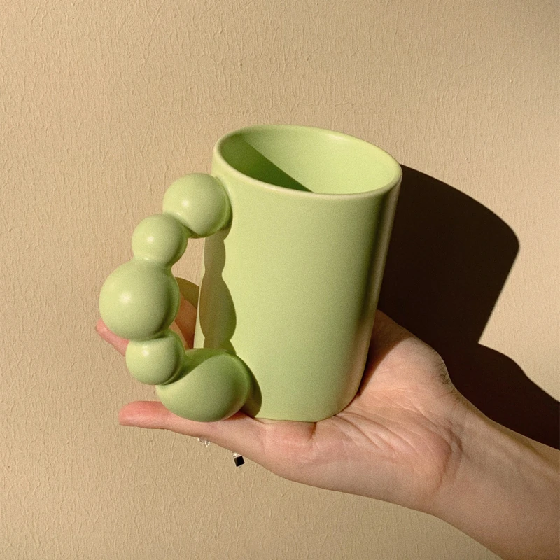 

New Handmade Porcelain Tanghulu Mug Creative Rotating Ball Handle Art Cup For Coffee Tea Milk Water Unique Birthday Wedding Gift