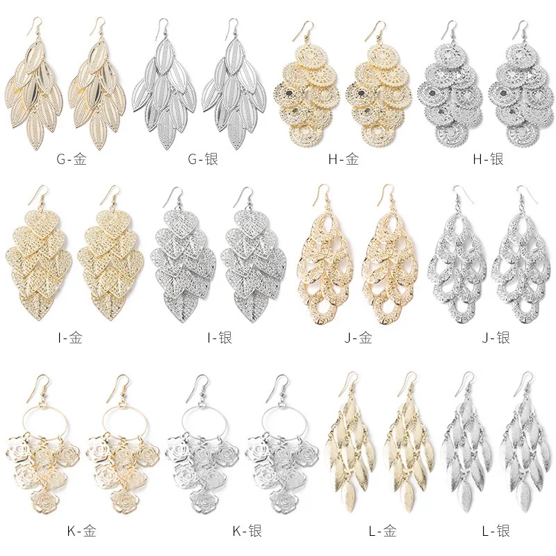 Преувеличенные атмосферные длинные просвечивающиеся листья серьги с надписью