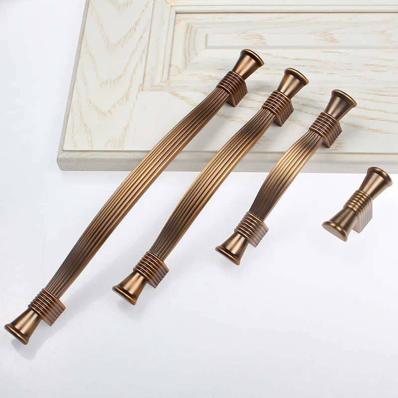 Ручки и ручки для шкафов в современном европейском стиле цвета слоновой кости