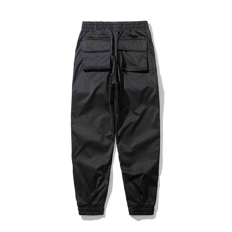 

American high street sports style casual pants Street hip hop sports solid elastic lace up small leg casual pants