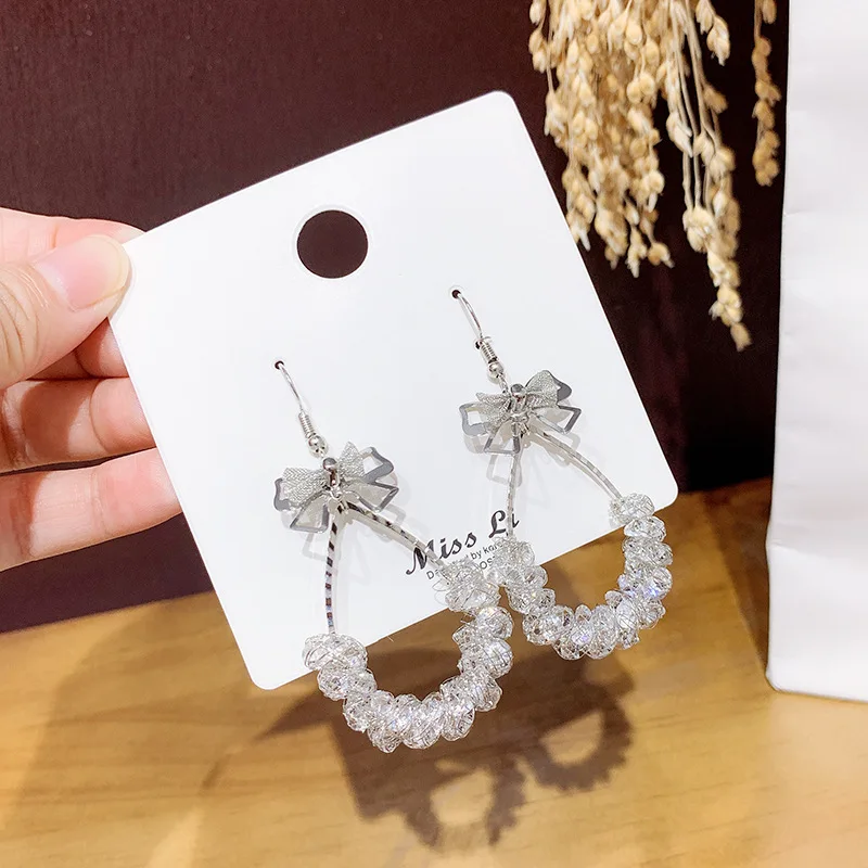 

[Quality models] Korean wild bow crystal earrings, net red personality new high-end ear jewelry