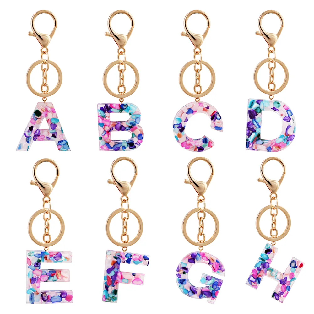 

High Quality Gold Keyring 26 English Word English Letter trendy Keychain Glitter Resin Acrylic Handbag Charms For Woman keyring