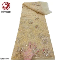 luxury handmade beads lace fabric with sequins latest nigeria embroidery lace tulle fabric for wedding dress beaded rjw 849