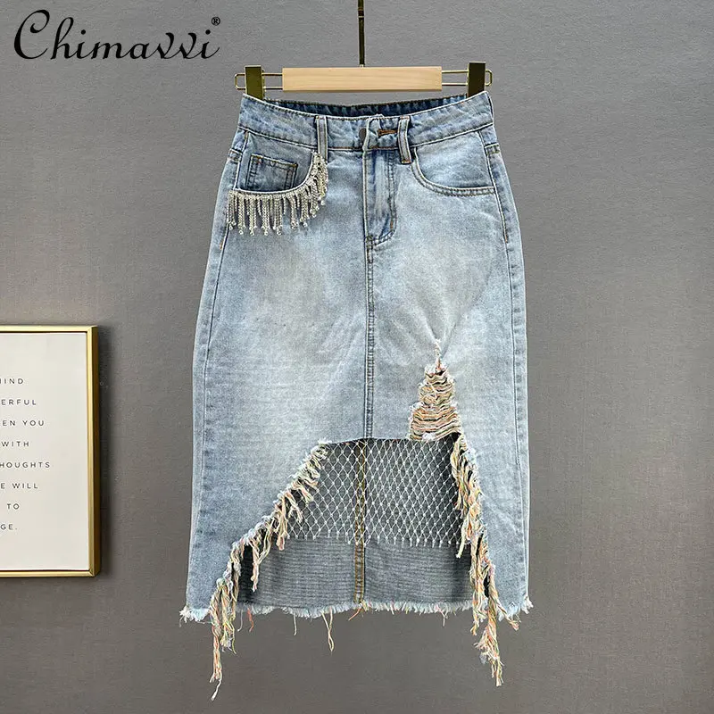 

2021 Summer New Fashion Sexy Chains Tassel Asymmetrical Denim Skirt Women's High Waist Slimming Diamonds Fishnet Ripped Skirt