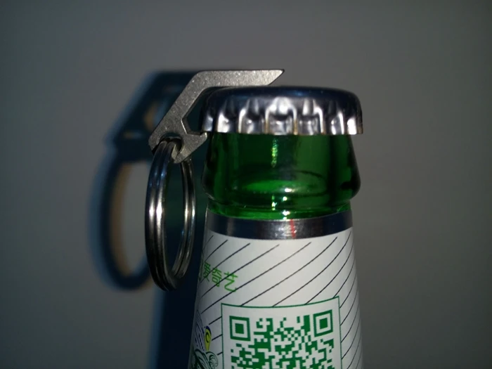 

Titanium alloy creative mini bottle opener can opener stainless steel multi-function keychain outdoor gadget