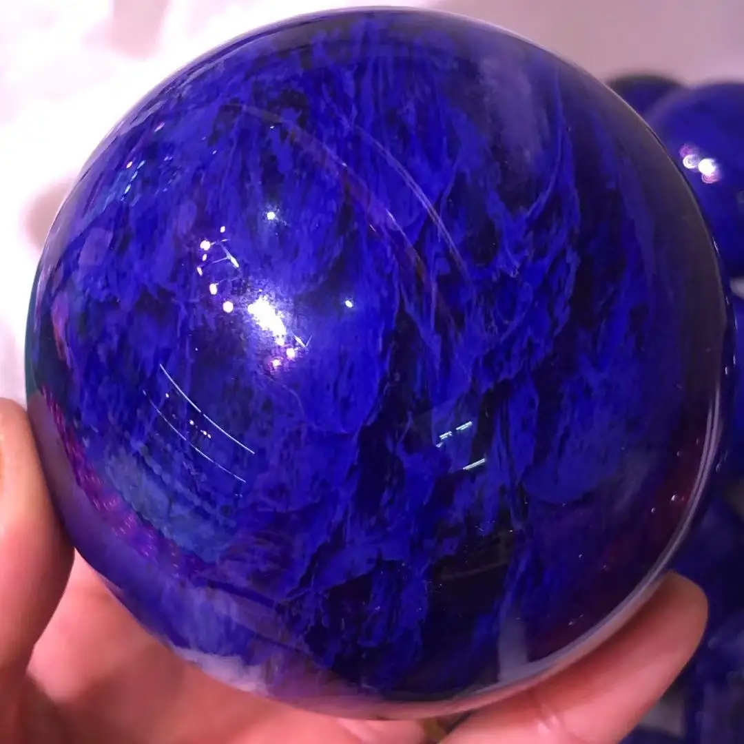 

The natural blue smelting stone makes the perfect sphere.Crystalline energy is used for reiki healing