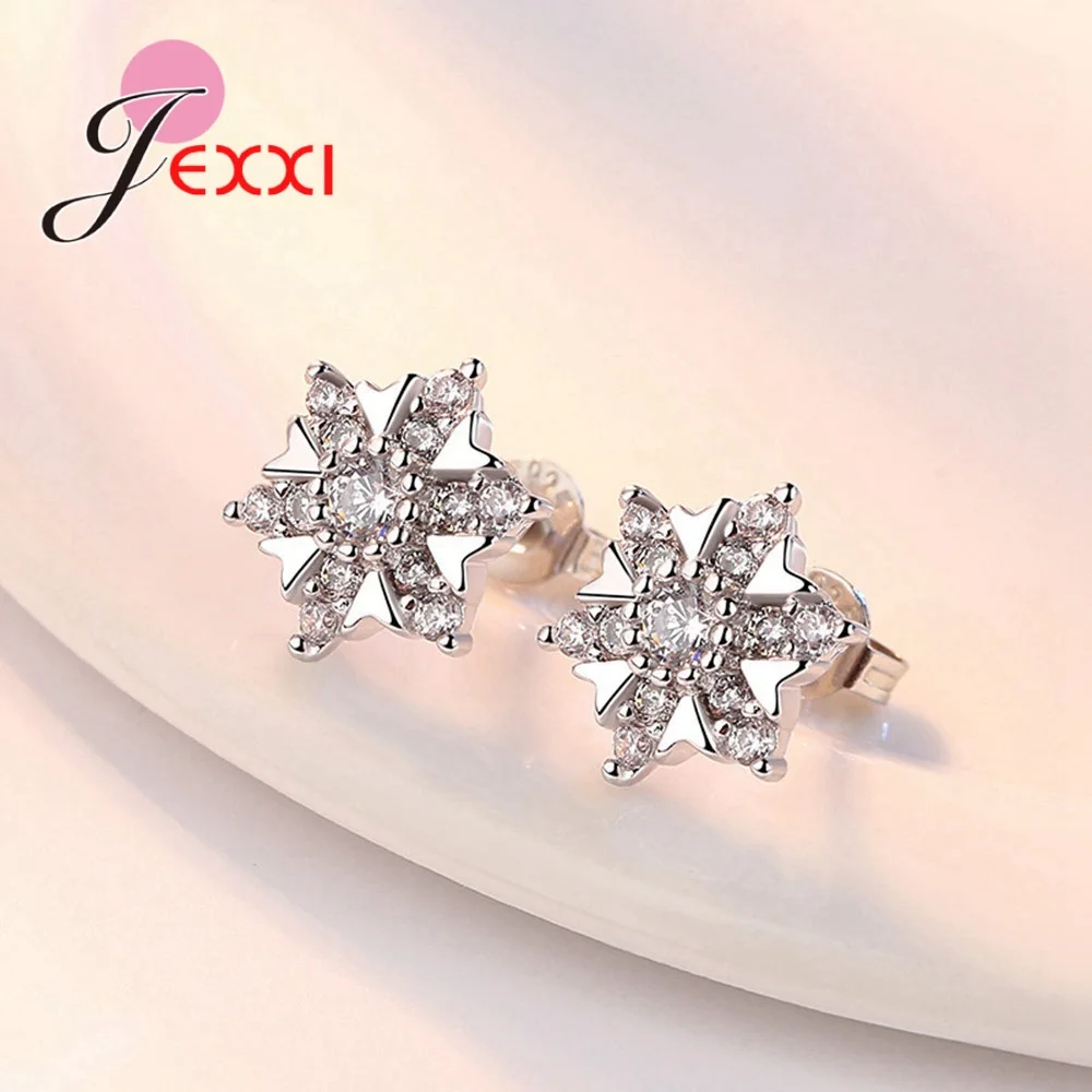 Серьги-гвоздики с розовым и прозрачным кубическим цирконием серьги в виде