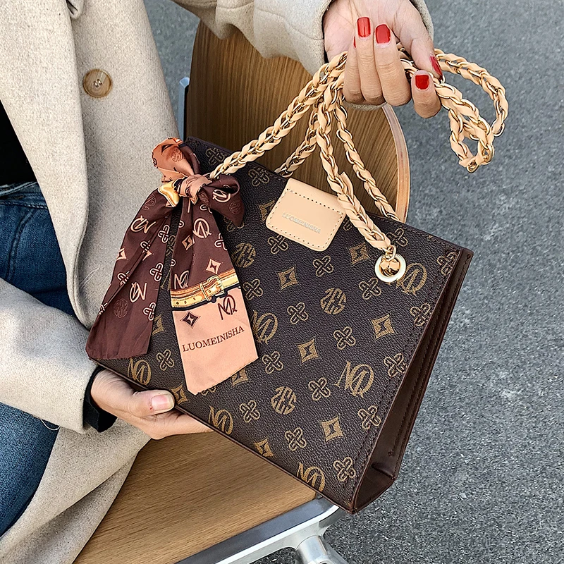 

Модные дизайнерские сумки с цепочками, брендовая роскошная женская сумка, 2021 кожаные сумки на плечо, женская сумка через плечо с цветочным п...