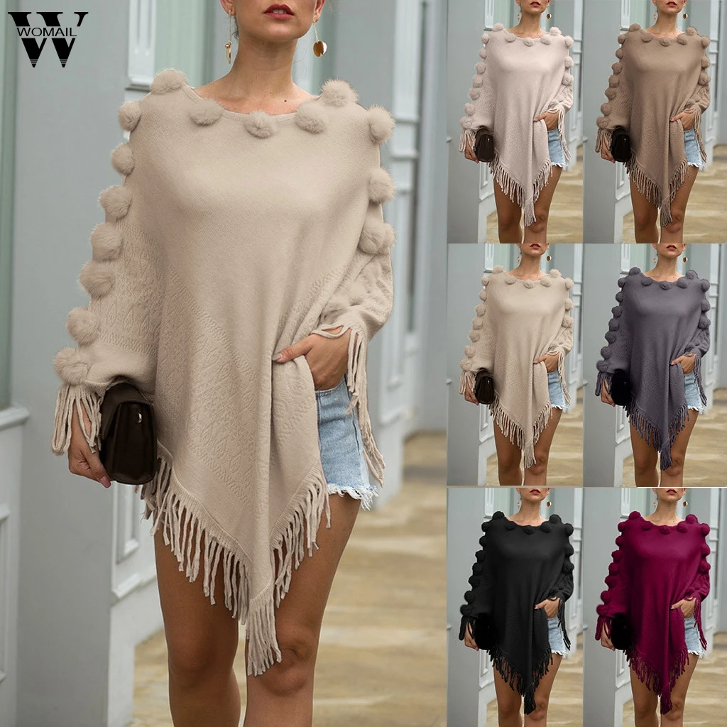 Свитер женский зимний трикотажный с круглым вырезом и кисточками| |