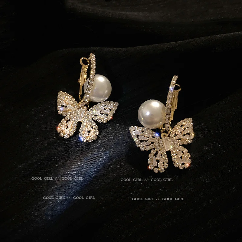 

925 Silver Needle Korean Personality Simple Fashion Sweet Wind Temperament Butterfly Diamond Knot Earrings Female