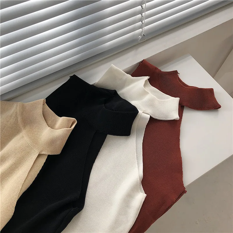 

Sueter de punto con hombros descubiertos para mujer, jersey de cuello alto sin mangas, ropa Sexy de color negro, blanco y Beige