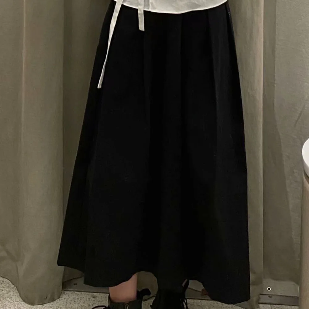 

2021 Skirts women's long with high waist pleated New spring black Look thin, all-match a word Simplicity skirt