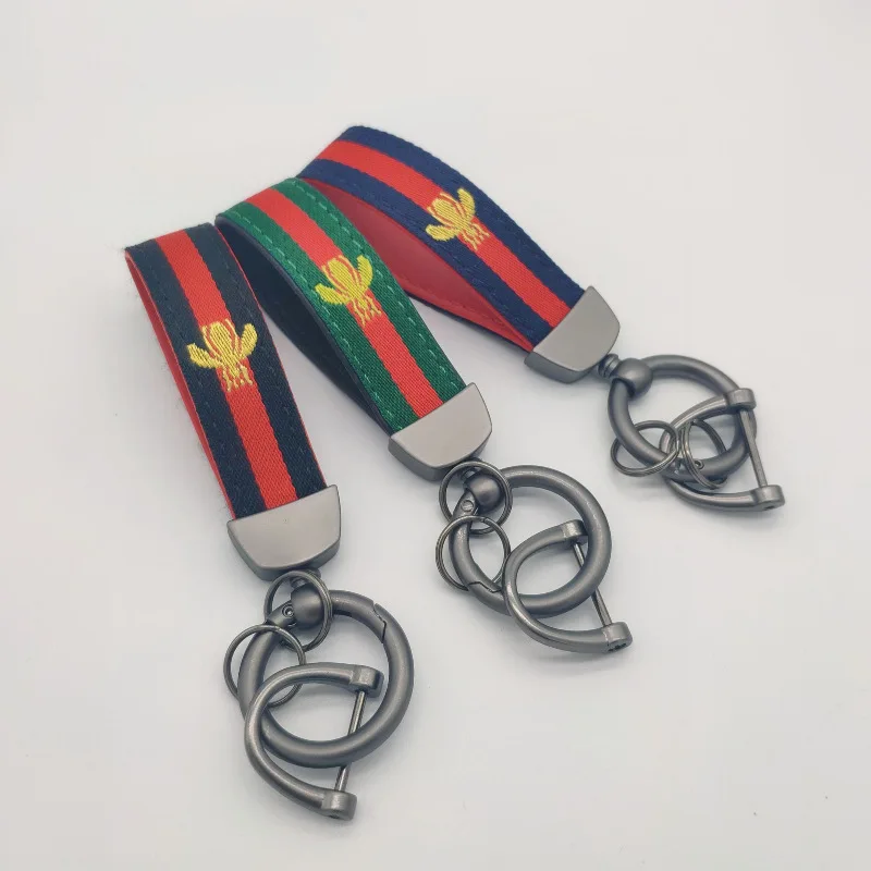 

Car keychain key ring buckle fashion trend little bee three-color webbing Car key chain for Car key ring chain pendant gift