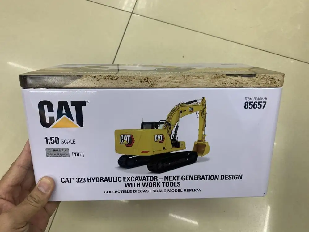 Гидравлический экскаватор CAT 323 дизайн следующего поколения с рабочими