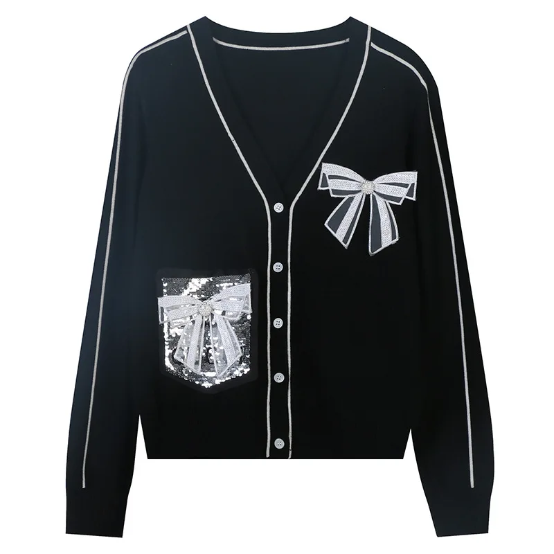 

Женский трикотажный свитер с бантом и V-образным вырезом