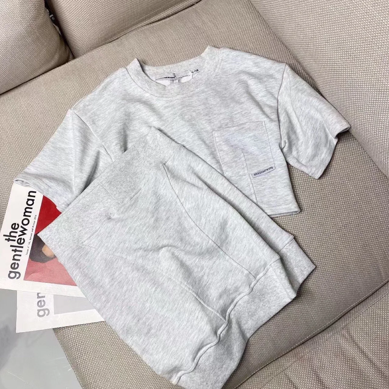 

Hot-selling AW WANG2021 Spring and Summer New Single-pocket Black Jacket Waist Slimming Half Skirt Suit