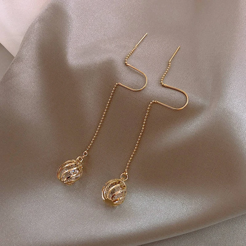 

Dominated Women Korean Long tassels metal hollow ball design fine crystal Drop earrings 2021 Classic style New earrings Jewelry