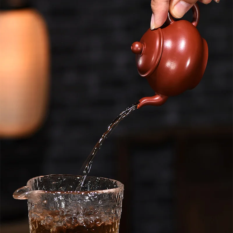 

Yixing raw ore purple clay pot handmade by famous master of Dahongpao ball hole small magic lamp pot