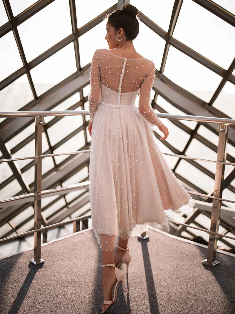 

2021 Latest On Sale Blush Pink Peals Bridal Wedding Gowns Tea Length Illusion Jewel Neck Wedding Dresses for Bride Long Sleeves