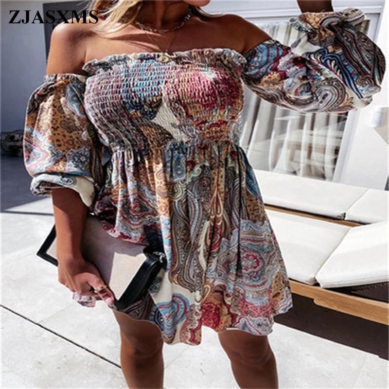 

Женское платье-трапеция с длинными рукавами-фонариками и оборками