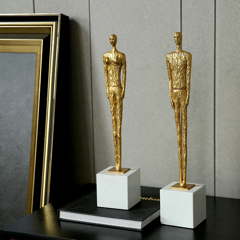 

Abstract Golden Male And Female Metal Figures Statue Ornaments White Marble Base Sculpture Art Decor For Home Living Room Office
