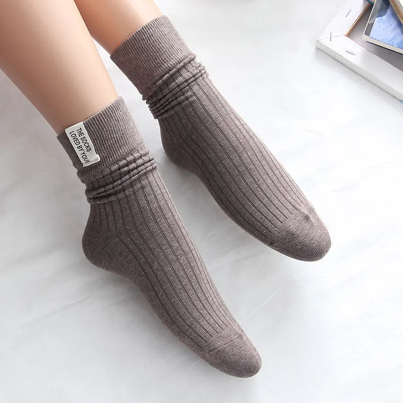 

Heap Pile Of Socks Women's Autumn And Winter Tube Socks New Cloth Label Pure Color Ladies Fashion Ins Cotton Socks Wholesale