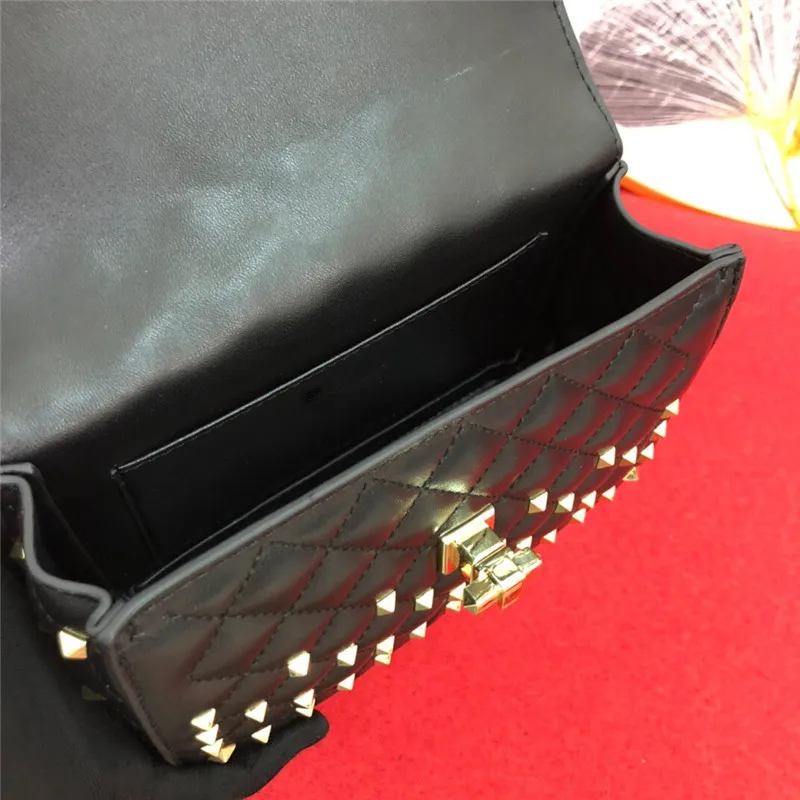 

Luxury star in the same style Portable flip bag leather chain rivet small square bag High quality genuine leather Shoulder bag