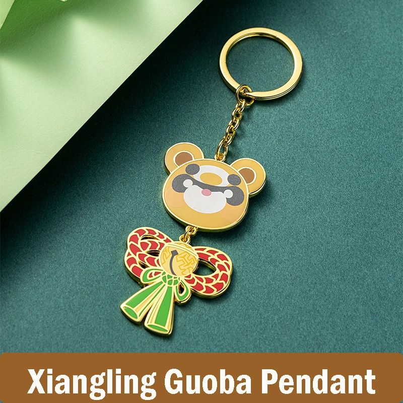 

Game Genshin Impact Cute Xiangling Guoba Imitation Enamel Metal Keychain Bag Pendant Collection Medal Keyring Souvenir Toy