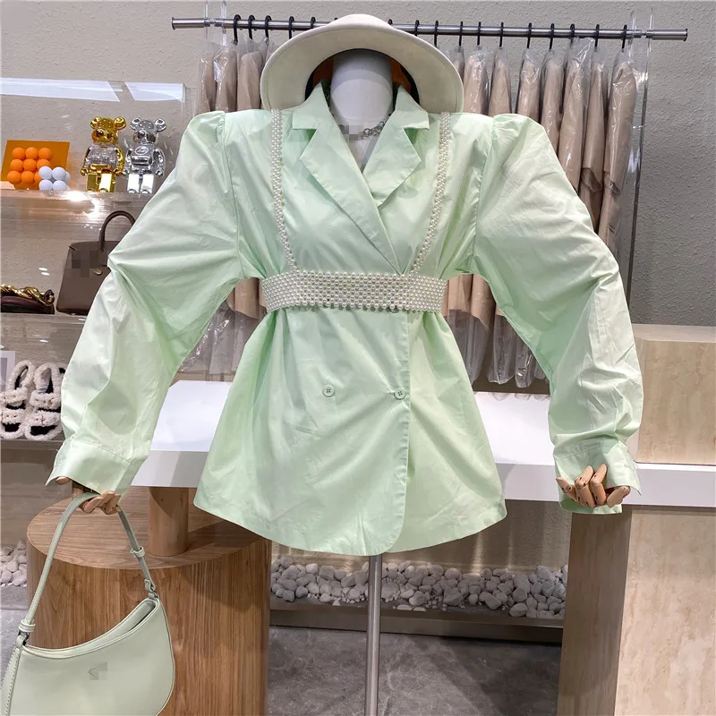 

Оригинальный брендовый дизайн, Aage для снижения Карамельный цвет с лацканами двубортное пальто с рукавом-фонариком, с жемчужные ремешки кос...