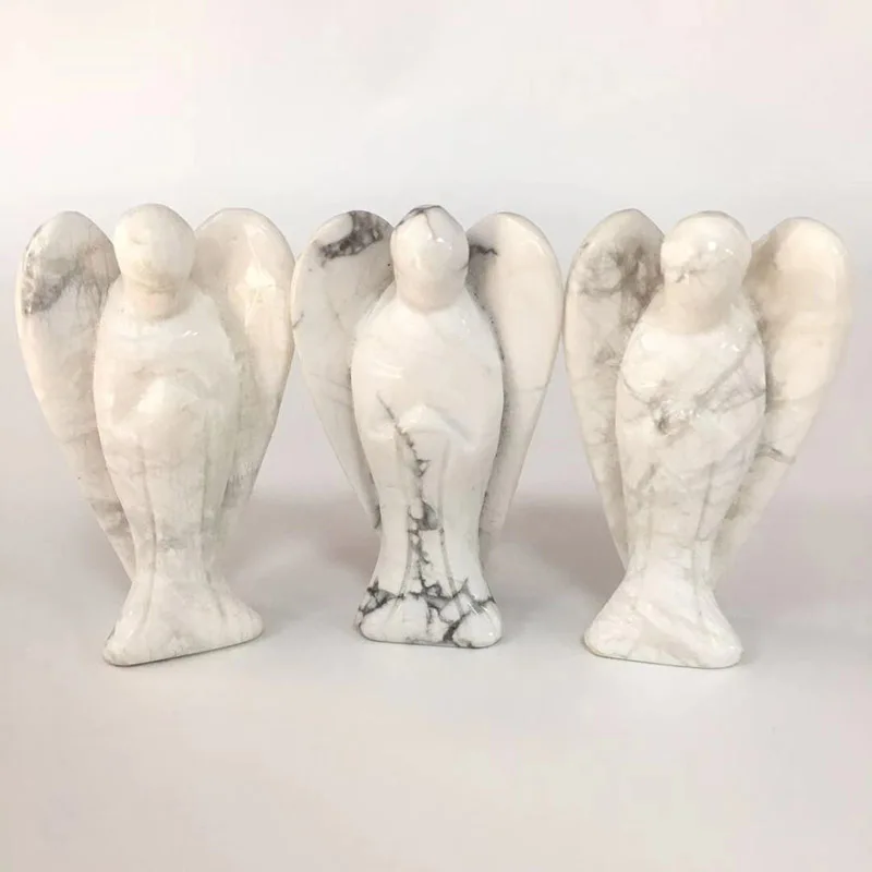 Оптовая продажа с фабрики 3 дюймов натуральный Howlite Ангел форма Кристалл