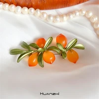 huanzhi 2020 new autumn winter plant flowers leaves fruit orange art vintage brooch for women sweater coat accessories jewelry