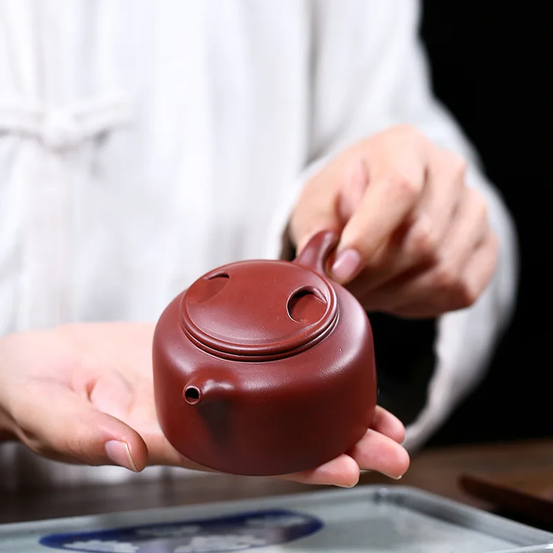 

Yixing handmade teapot raw material purple clay small product ox cover purple sand pot set tea set