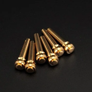 

A set of six pure copper studs of a guitar string Folk guitar solid cone The guitar brass string column Extended fermata